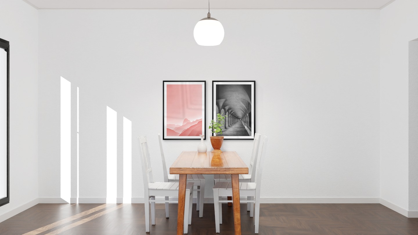 Tavelvägg med ramar i svart i storlekar 50x70 med posters med "Rosa himmel" och "Gång med pelare och valv"